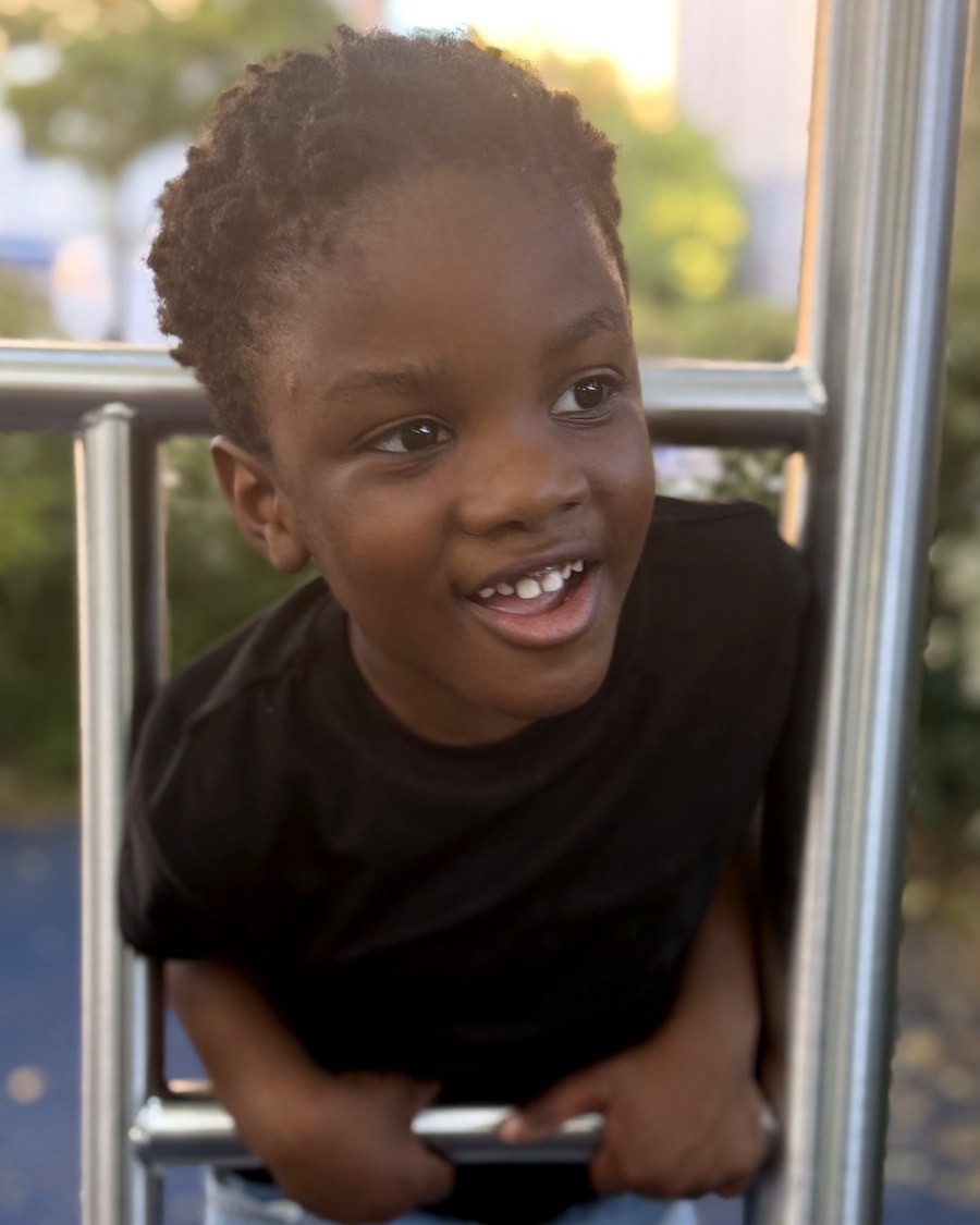 Majeed, smiling
